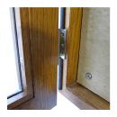 Interior detail of Greenbarnes oak noticeboard, showing standard sundeala pinboard, stainless hinge, weatherseal and glazing detail.